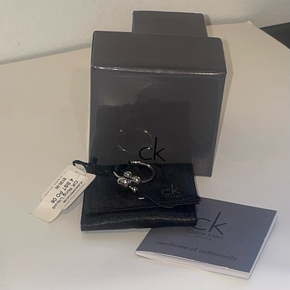NWT Calvin Klein Liquid Bubble Dangle Stainless Steal Fidget Spinner Ring NIB